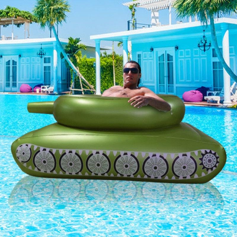 Children's inflating toy tank swimming pool surfing on a sit-in-a-seating boy with a floating water gun