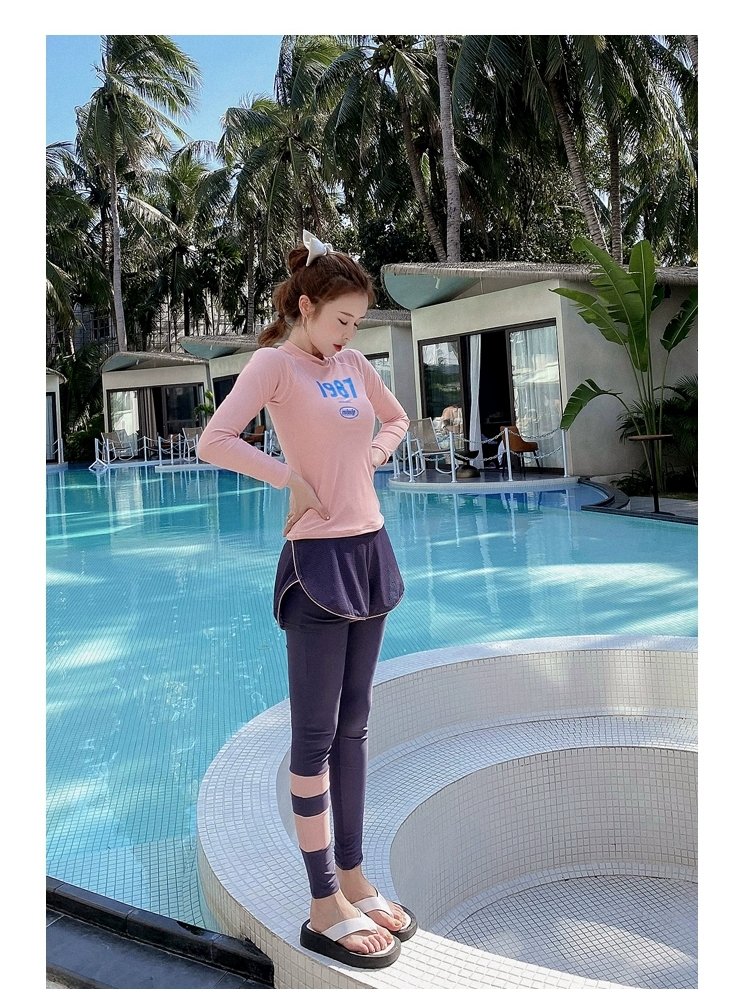 Long-sleeved long-sleeved tan-proof scuba swimsuits, four sets of surfers, show a new sense of slenderness