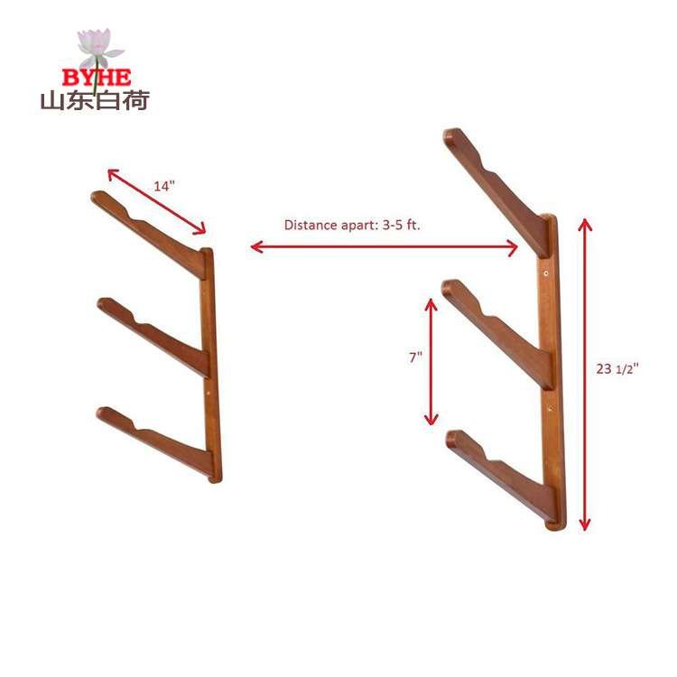 A stand-up surfboard stand-alone stock of bamboo surfboards displays a wall-mounted bamboo frame