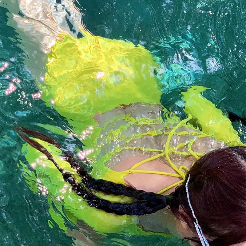 The yellow long-sleeved, thin-skinned swimsuit girl in 2024