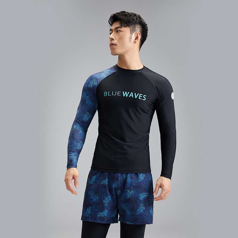 Outside. New part bathing suit for a man with a black dry-dry surfing suit