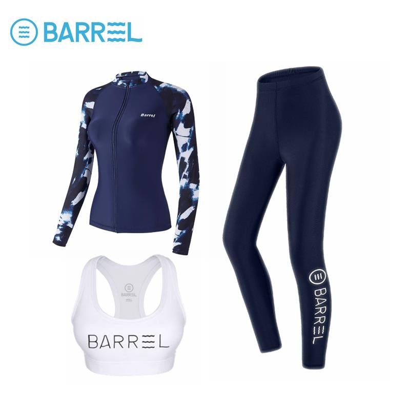 The lady's bathing suit is tan-proof, long-sleeved, long-sleeved, long-sleeved, and she's warm