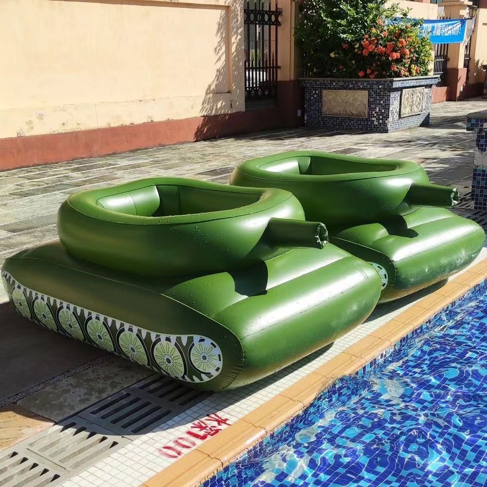 Children's inflating toy tank swimming pool surfing on a sit-in-a-seating boy with a floating water gun