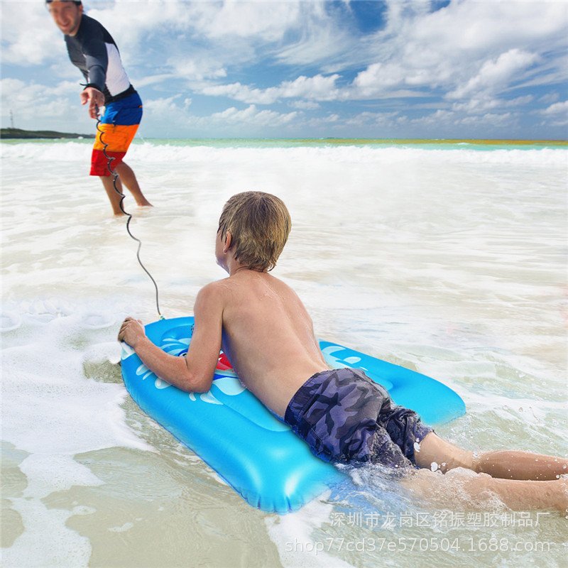 On the beach, shark surfboard floats, new water inflatable surfboards