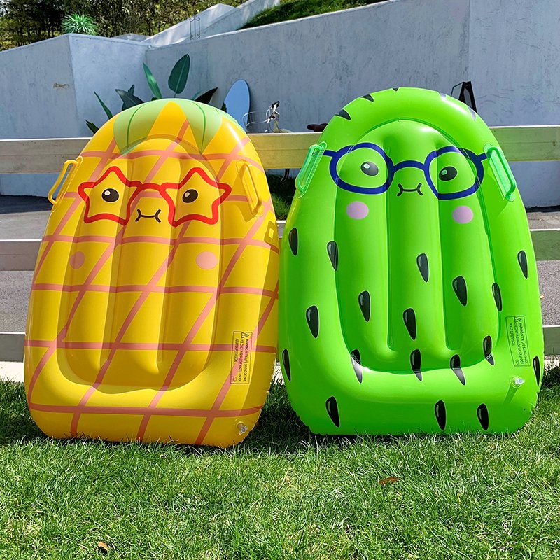 Pumpboard inflating surfboard children floating their water toys riding the flopbed to study the swimming pool training for waterboarding