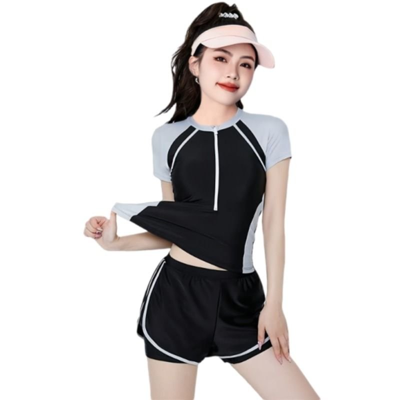 The bathing suit girl's summer scrawny-skinned, conservative-skinned sport swimsuit student specializing in flat surfing