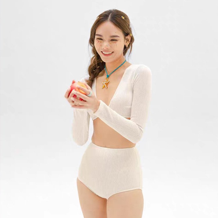 Berry-coloured long-sleeve, hot-swipe surfer, bikini high waist liner, white sea sunscreen