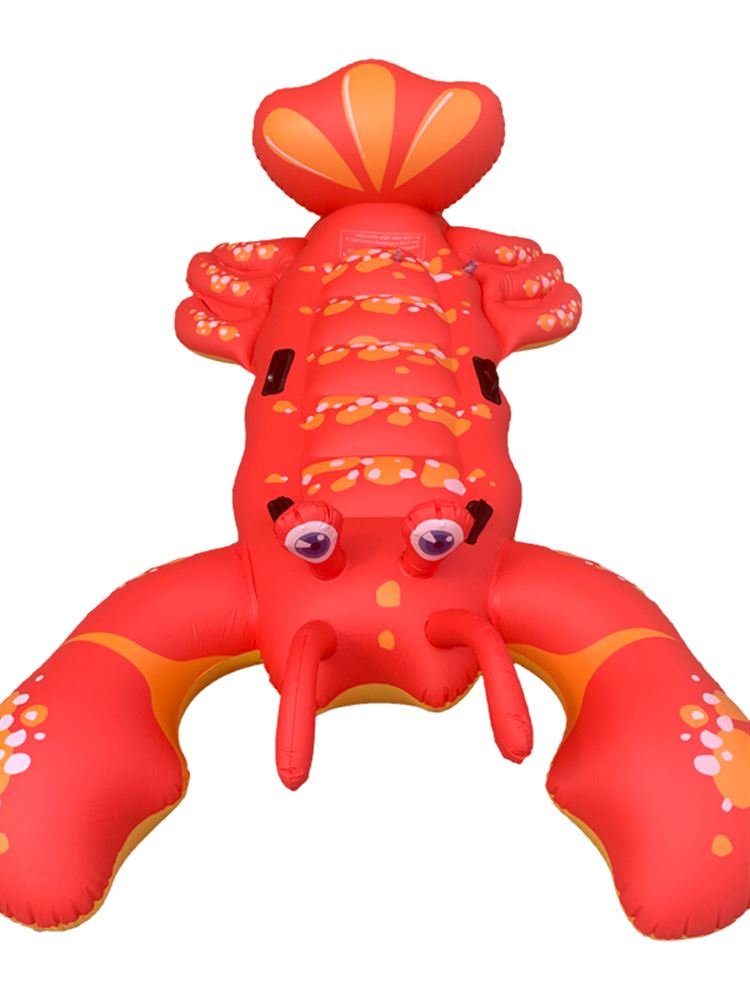 The swimming ring is inflated with a big shark, a big water toy adult, a red whale surfing dolphin