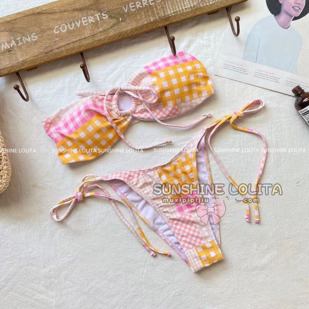 pink orange plaster with a bikini with a three-point bikini swimsuit girl, sanya