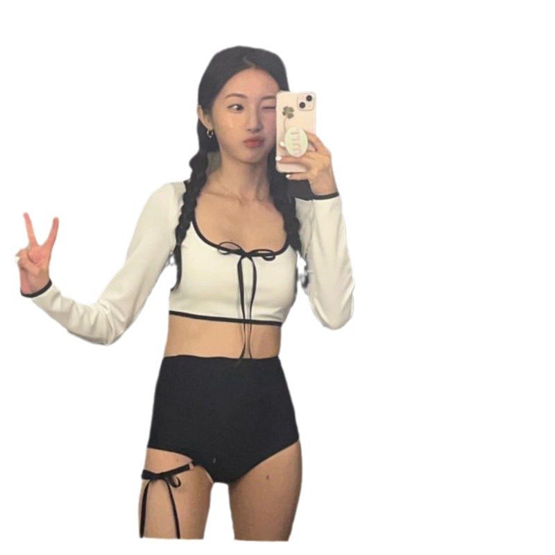 The summer bathing suit girl's 2024 new hot long-sleeved sun-proof twirl-covered scrawny surf suit
