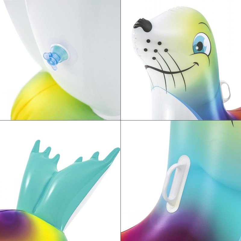 A LITTLE INFLATABLE SWIMMING RING FLUORESCENT SEALS RIDING A BABY BOY A TO PLAY WITH A CHILD SURFER
