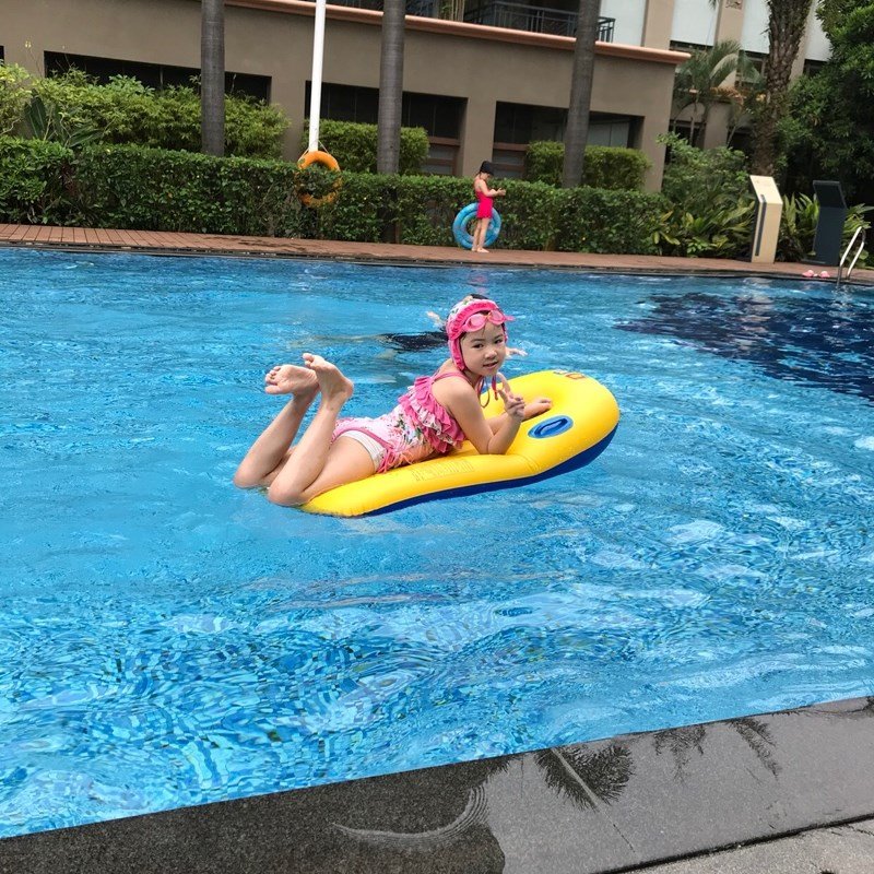 With thick children swimming and skiing, inflating float-bed kids with hands on boats and toy boats