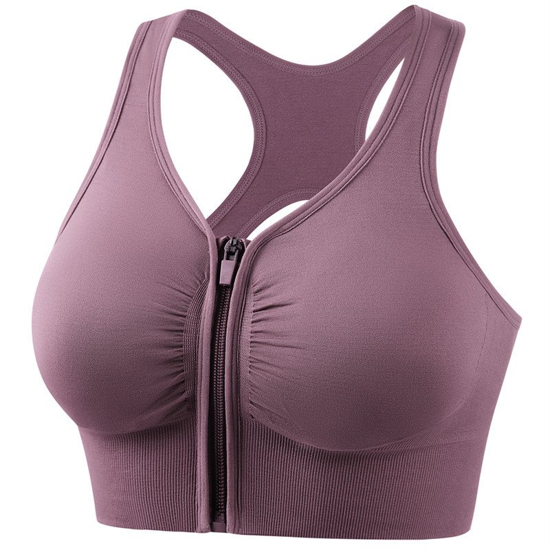 One piece of bathing suit for a lady on a beach diving on a bikini surfing in front of a bathing vest