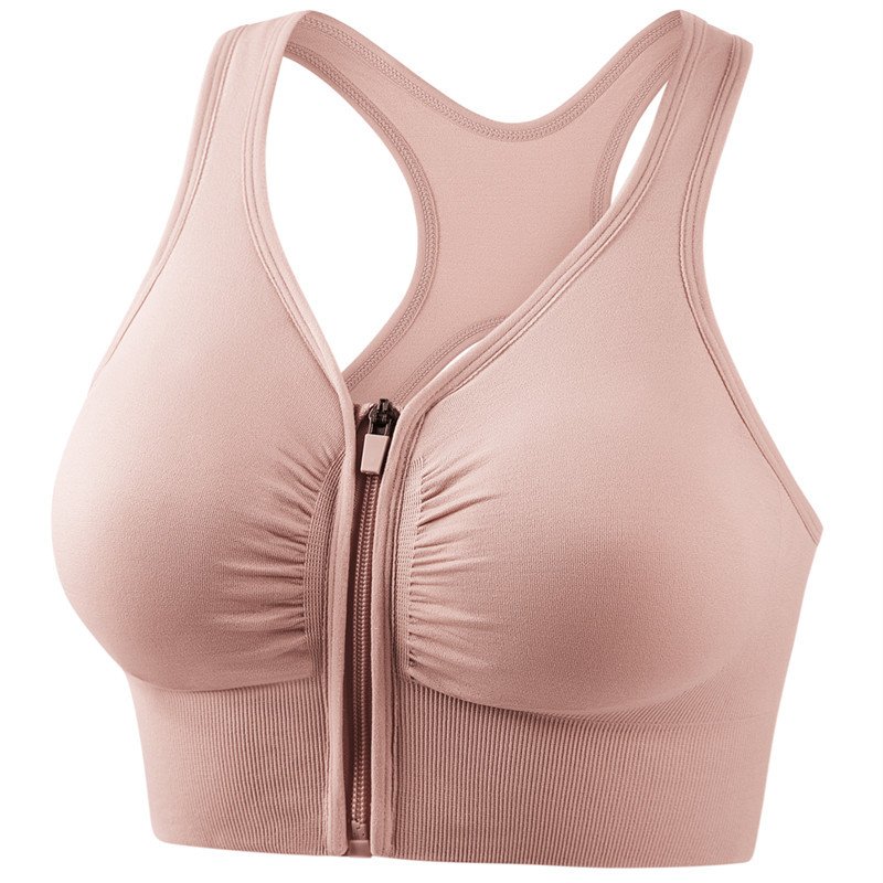 One piece of bathing suit for a lady on a beach diving on a bikini surfing in front of a bathing vest