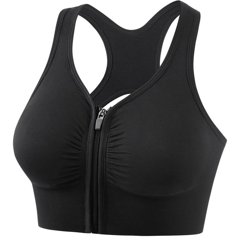 One piece of bathing suit for a lady on a beach diving on a bikini surfing in front of a bathing vest