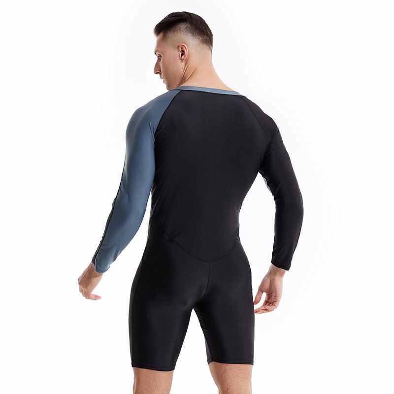 A man with a long-sleeved bathing suit, and a young man with a wet surf suit