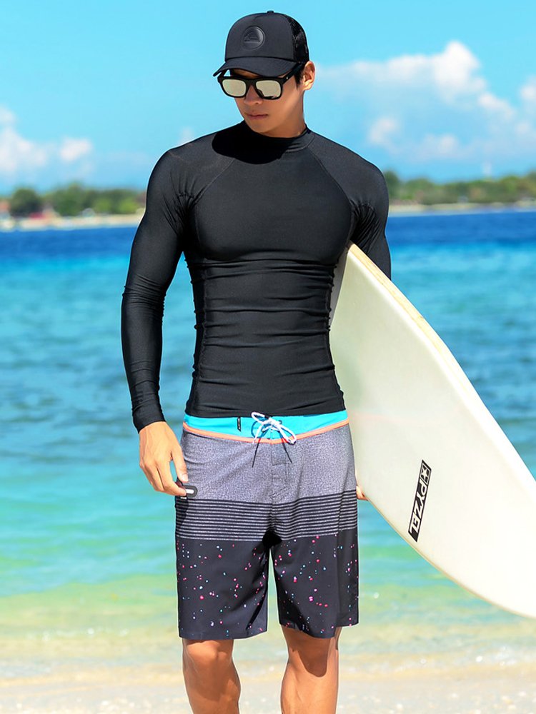 Swimming suit for a man with a bathing suit full of sands and surfing suits
