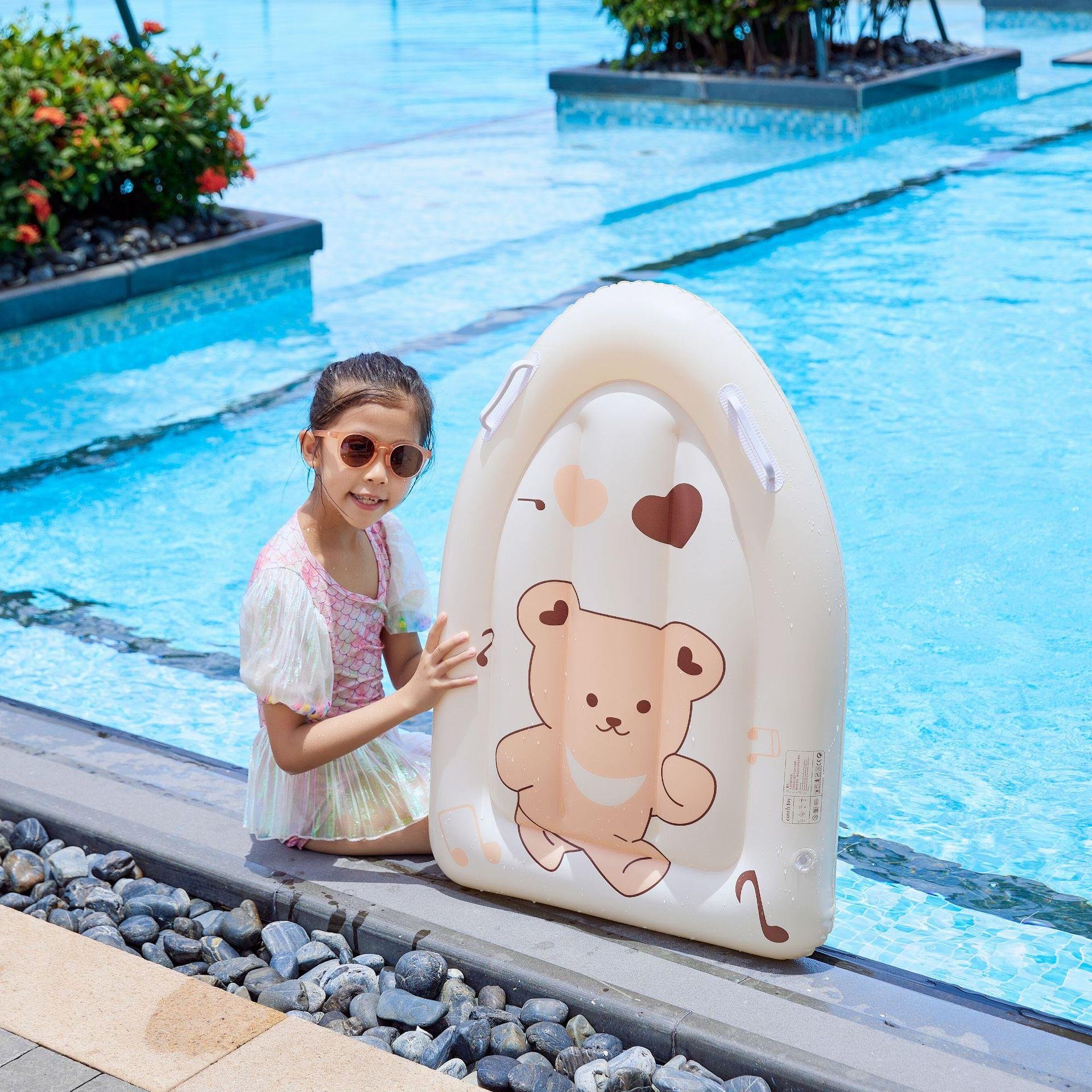Squids, children's inflatable plume and children's surfboard bands swimming on waterboards