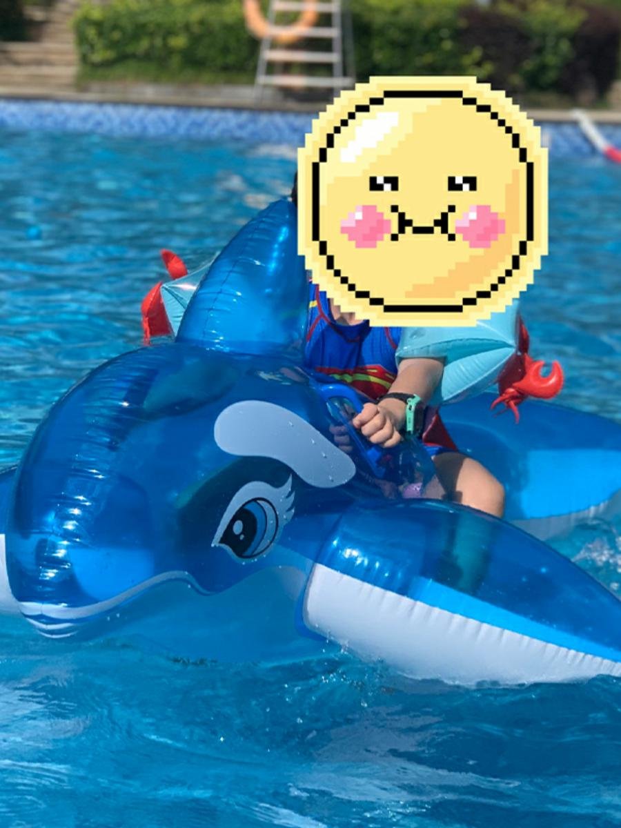 intex swimming pool floating toy on a children's swimming ring and surfing dolphin whale inflating