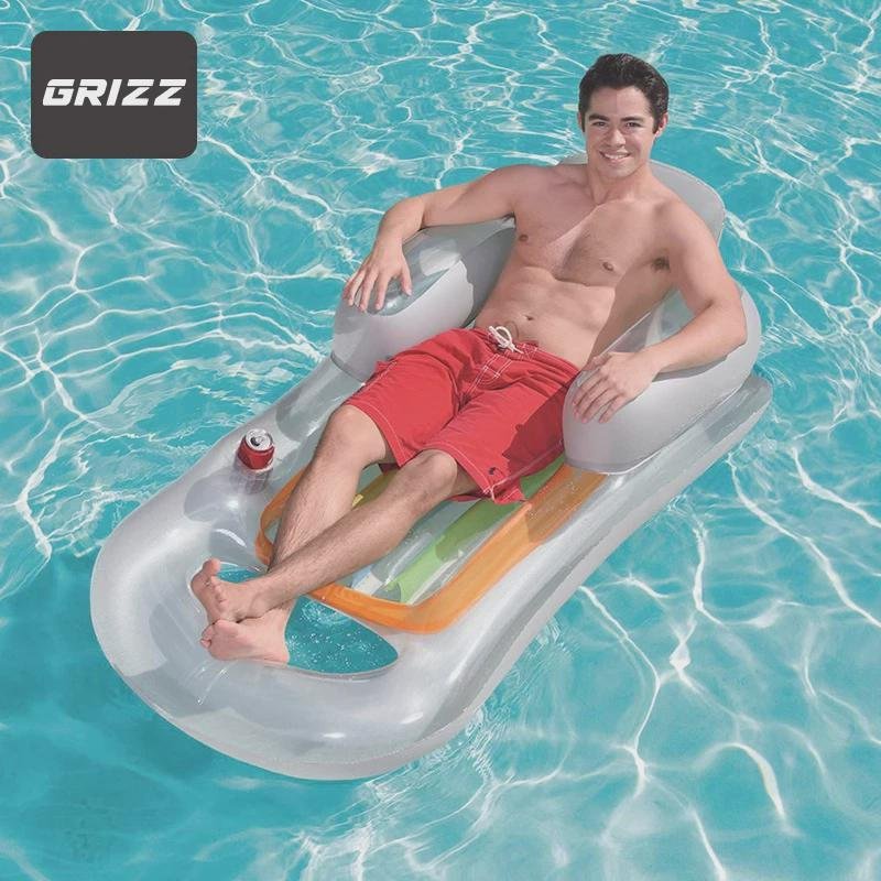 Inflated floating mattresses in the water of the seaboard beach of the German adult floundering swimming ring