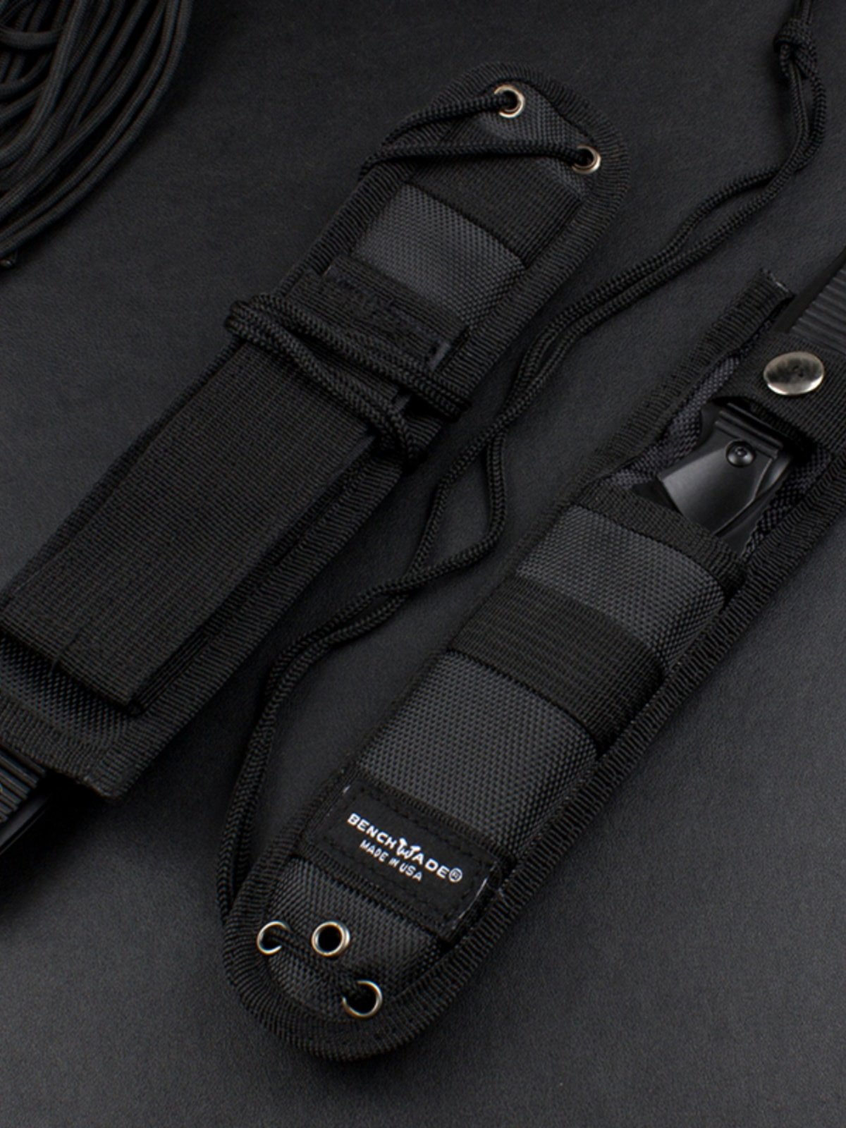 THE CAMPING EQUIPMENT FOR SURVIVAL OUTSIDE THE HOUSE HAS A SHARP BM140BK HUNTING KNIFE, A MULTIPURPOSE KNIFE