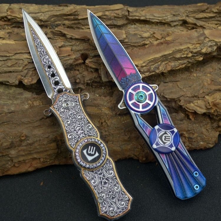 An outdoor folding knife pointed to a multi-purpose mini-cleaver camper with a high-heavy fruit knife
