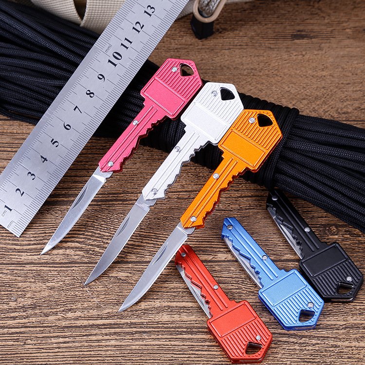 Portable key knife for exterior protection and a folding knife for travel with a stainless steel fruit knife