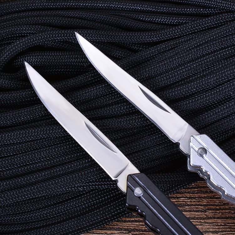 Portable key knife for exterior protection and a folding knife for travel with a stainless steel fruit knife