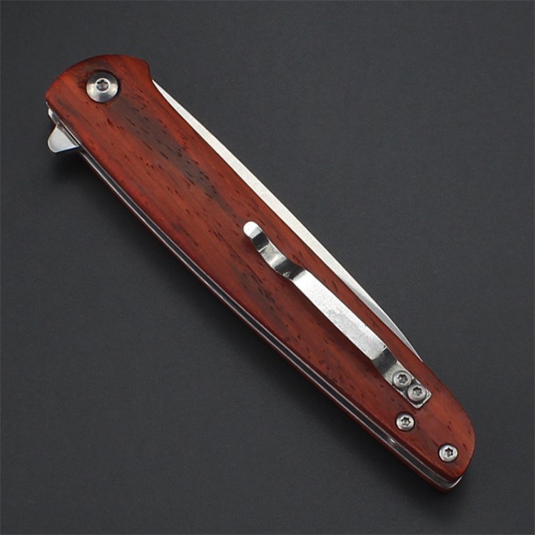 With a sharp, high-strength knife with a stainless steel for the outside