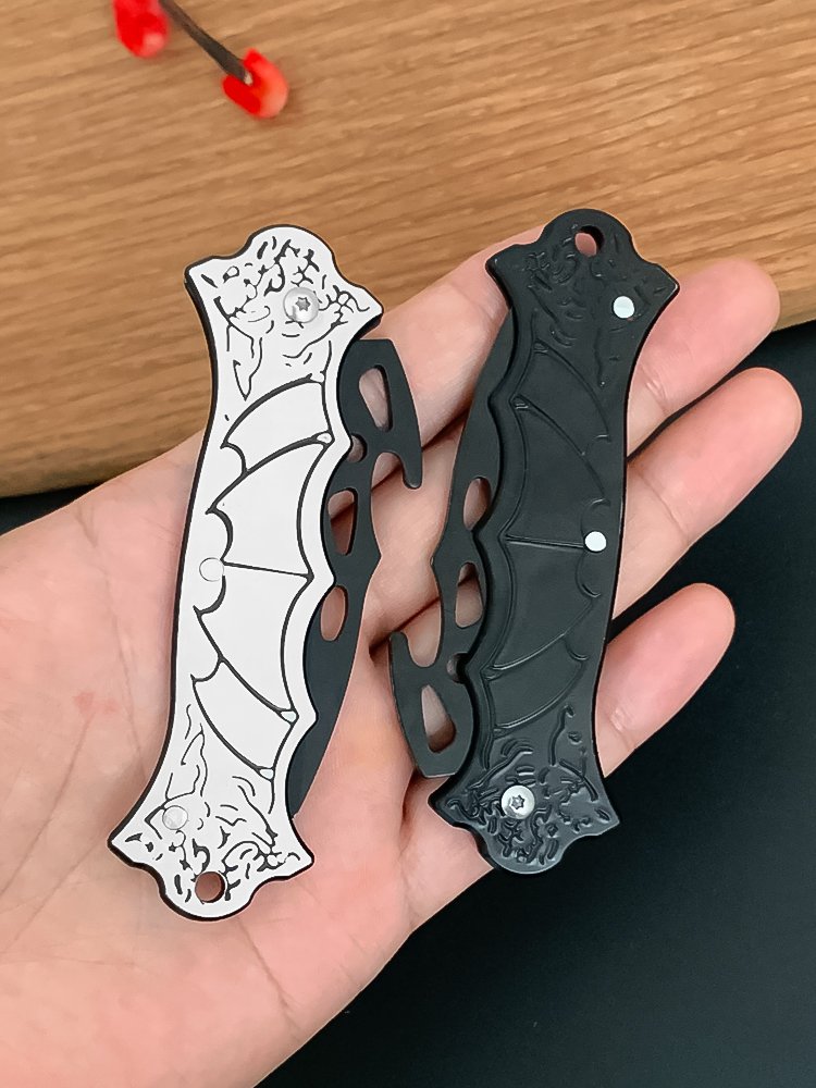The bat's collage of stainless steel and a sharp, high-intensity, outdoor fruit knife