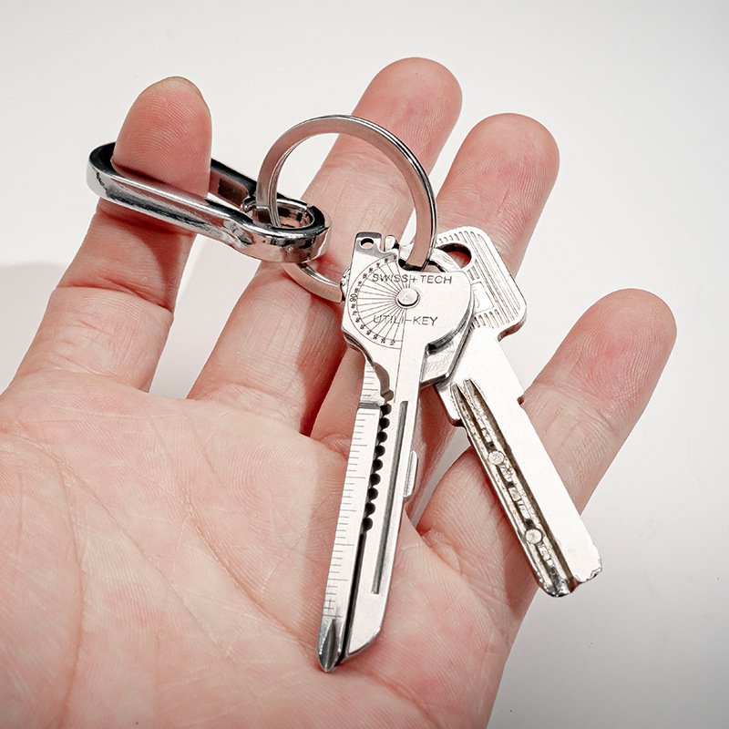An outdoor multi-purpose tool combination with a key-slice opener with a mini-slice opener