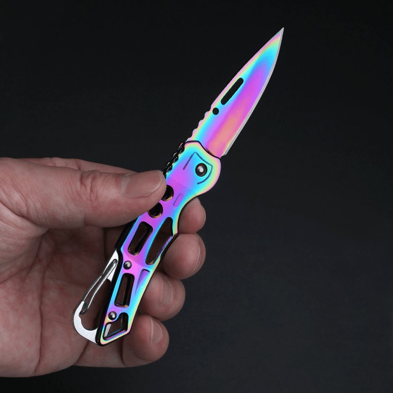 Stainless steel multi-purpose folding of small knives camping out in the open with small knives and a key to a small knife
