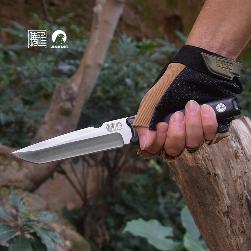 A camping knife with a sword to survive in the wilderness