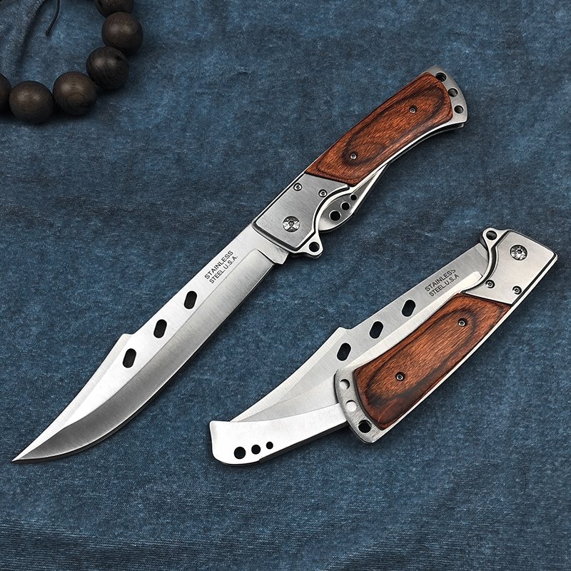 In the wild, the Swiss sergeant's multi-purpose camp guard carries a small knife with it