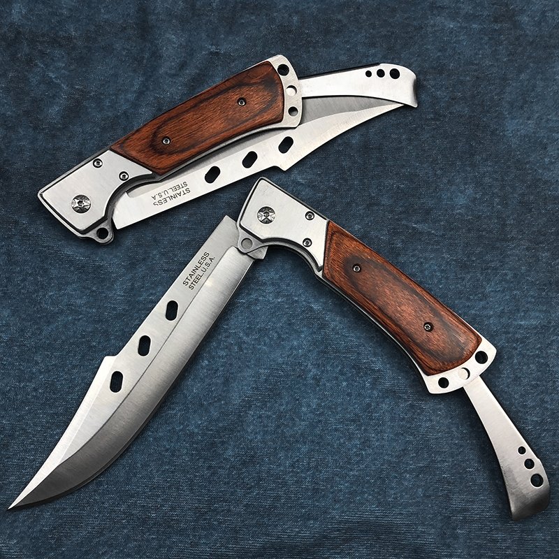 In the wild, the Swiss sergeant's multi-purpose camp guard carries a small knife with it