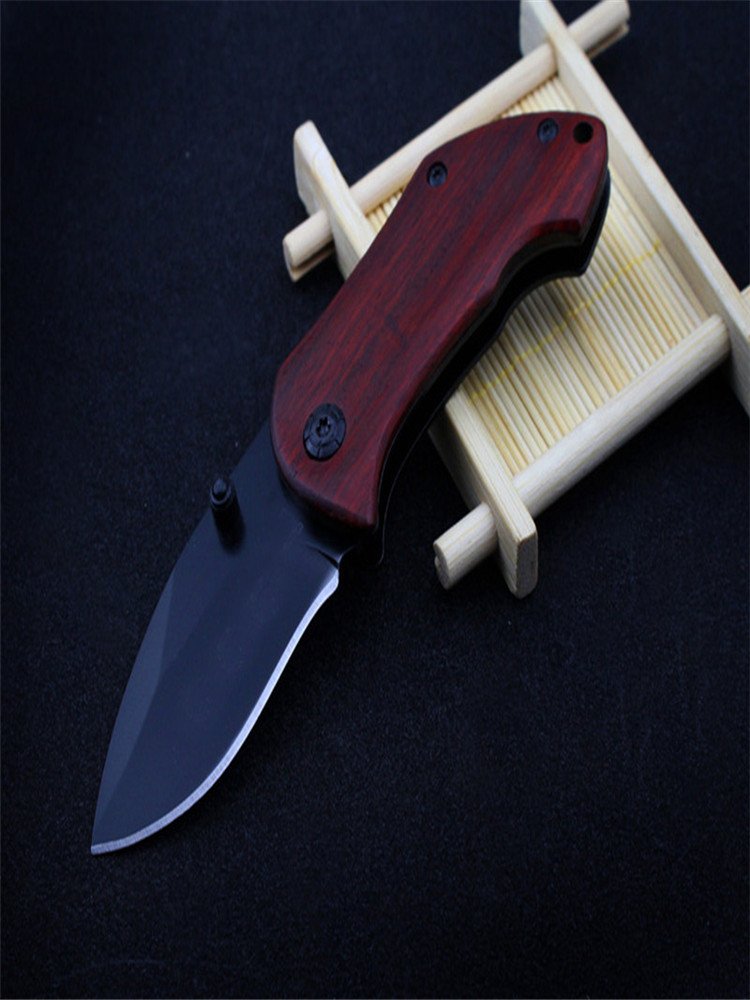 The stainless steel knife is a high-intensity, high-intensity external folding of the fruit knife and the mini-coloured military engineer camping knife