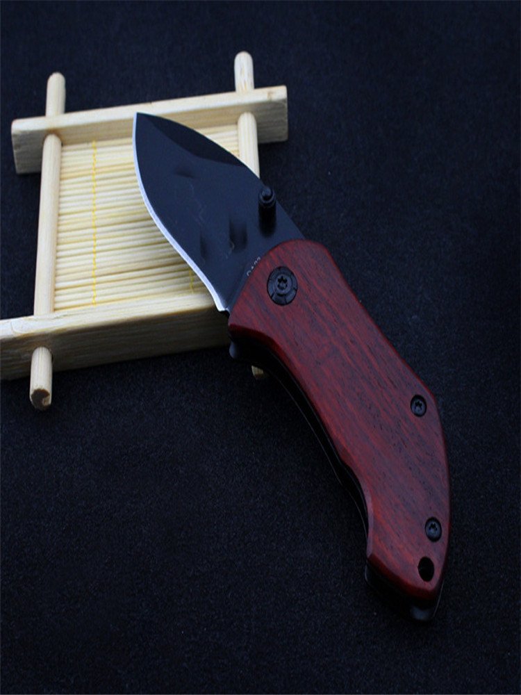 The stainless steel knife is a high-intensity, high-intensity external folding of the fruit knife and the mini-coloured military engineer camping knife