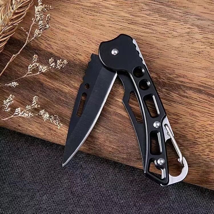 A multi-purpose folding knife carries a fruit knife with an outdoor sharp knife and a portable fielding knife