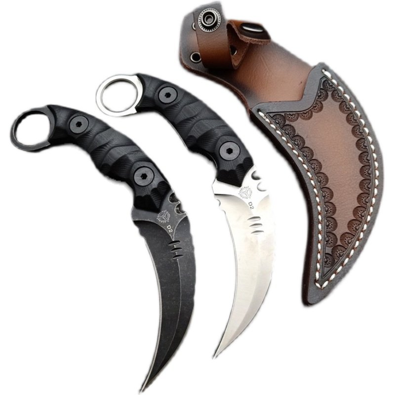 A HIGH-HARD D2-STRINGED KNIFE OUTSIDE THE HOUSE
