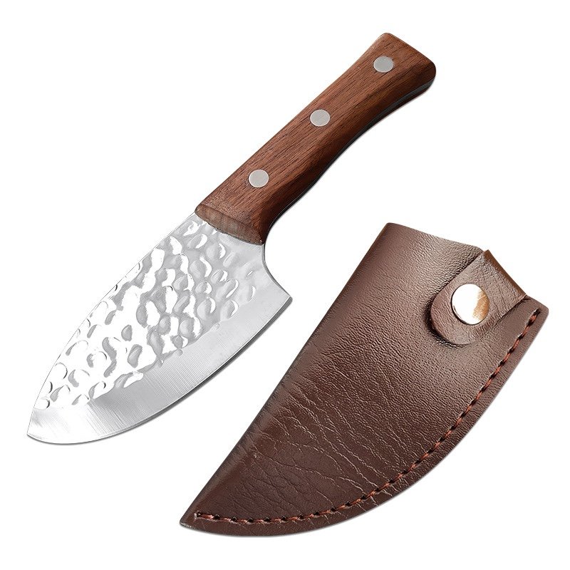 Dragon Springs scrutinizing a fish knife and a rusty steel kitchen with a cutter and a field knife