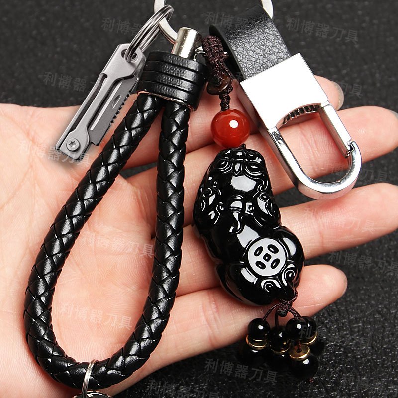 The mini-cracker's pellets, the stainless steel key buttons, and the delivery vehicle opens the box with the leather