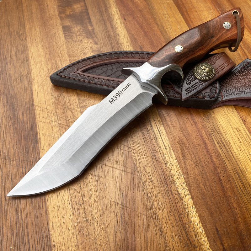 AN OUTDOOR KNIFE WITH A SMALL FIELD KNIFE