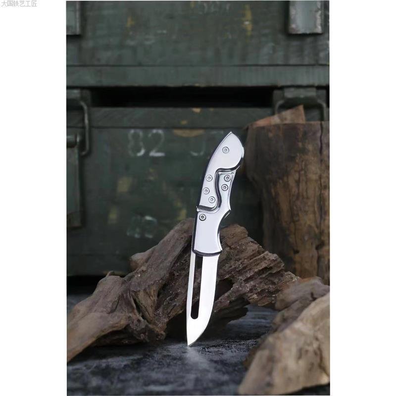 A silver knife folds in order to carry the fruit for delivery