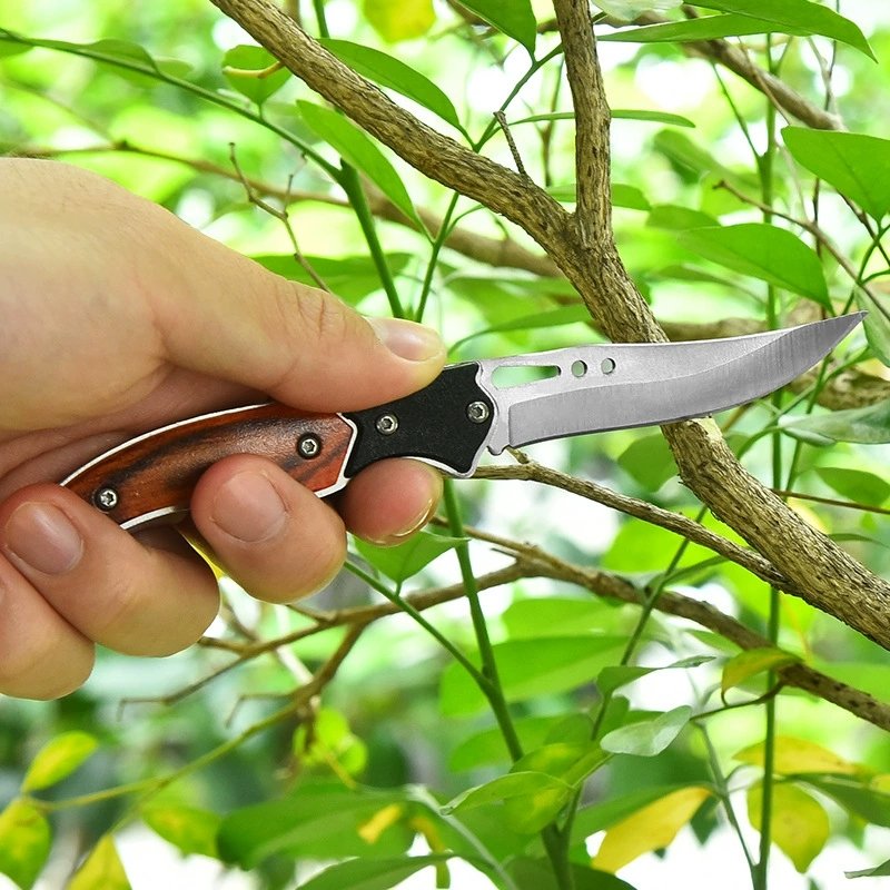 The outside knife folds the knife, and the mini-cruises the key to the knife, and then the knife goes up with it