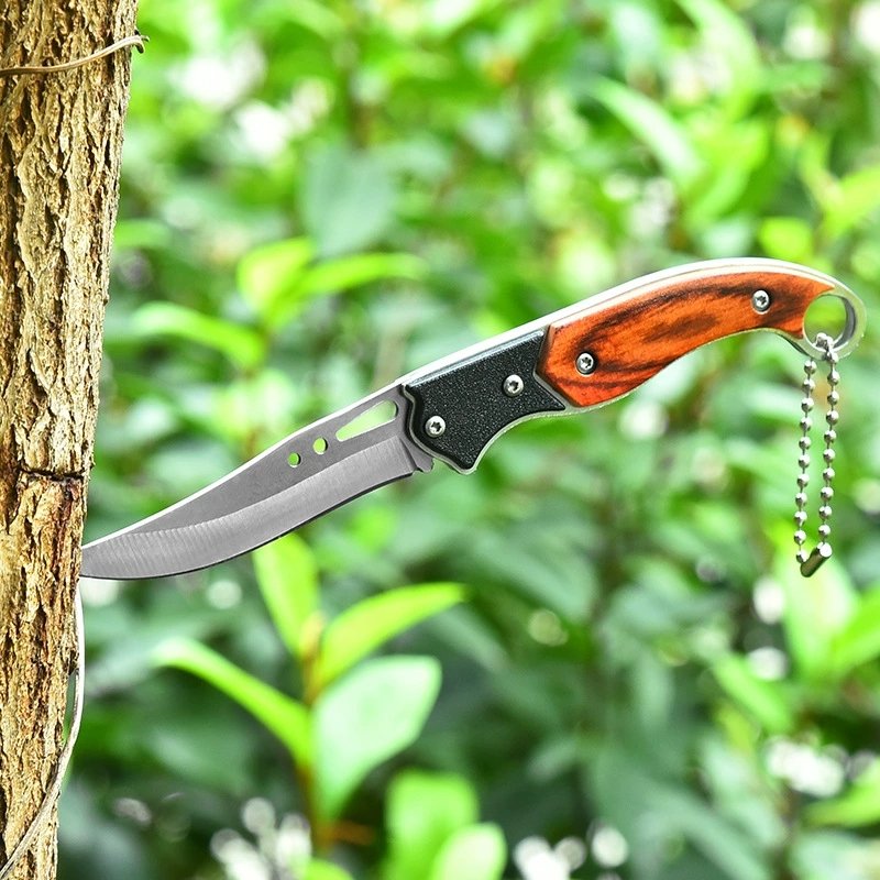 The outside knife folds the knife, and the mini-cruises the key to the knife, and then the knife goes up with it