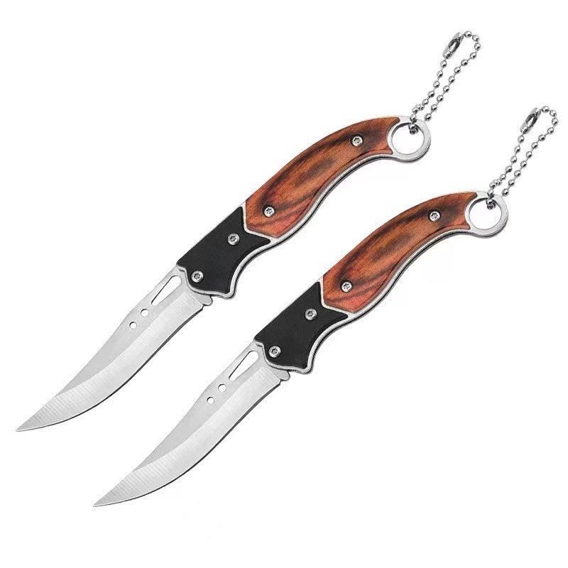 The outside knife folds the knife, and the mini-cruises the key to the knife, and then the knife goes up with it