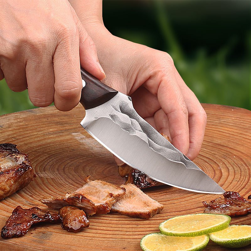 Home-to-home exercise hands cut a meat knife and a cow and a pig ate a meat chop outside the house