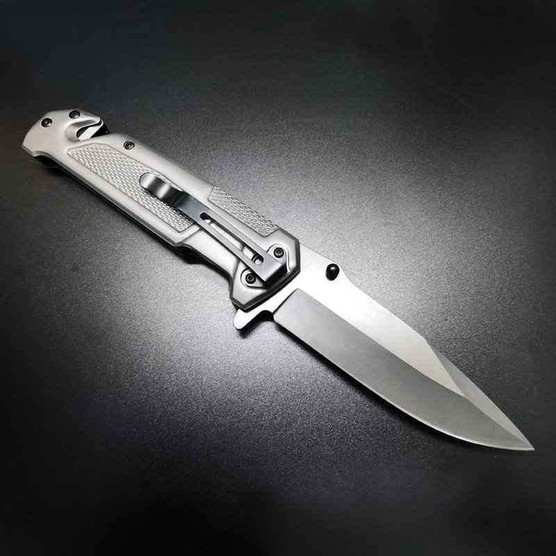 The field camp for a defensive survival knife folds a stainless steel knife to cut a window and cut a rope to survive