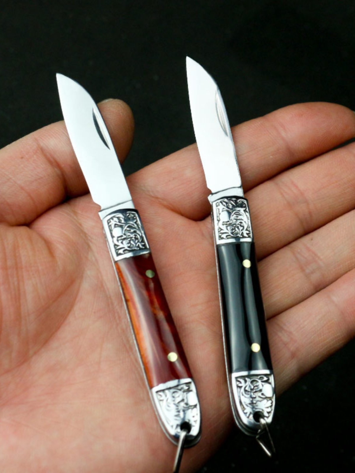 A little knife-mini-cracker with a sharp stainless steel portable outdoor camping fruit knife