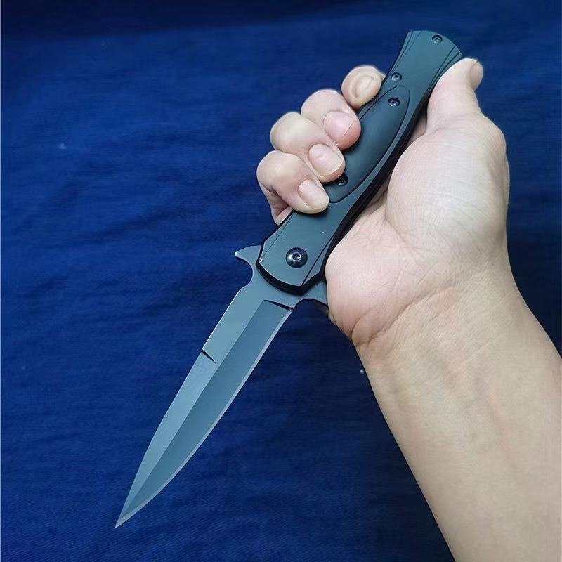 An open-air protection field camping knife folded with a fruit and stainless steel